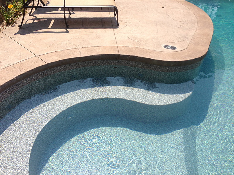 Swimming pool and stamped concrete project example 188